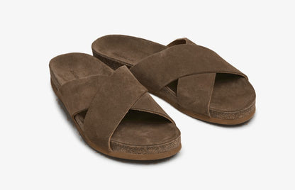 Brown suede cross-over slip-on sandals angled pair view