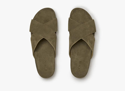 Green suede cross-over slip-on sandals top view